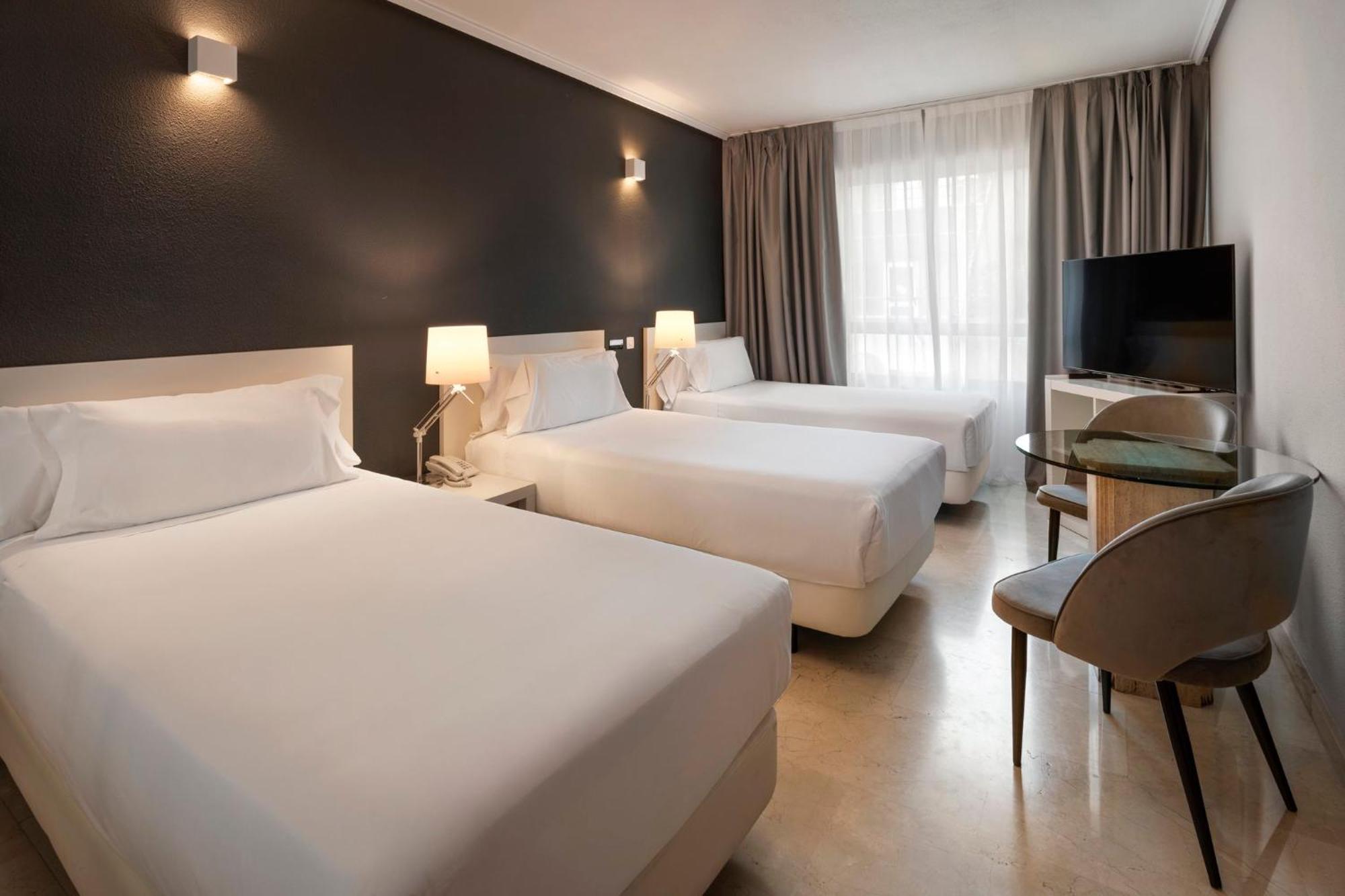 เอเซนเชีย โตกูมาร์ Aparthotel มาดริด ภายนอก รูปภาพ